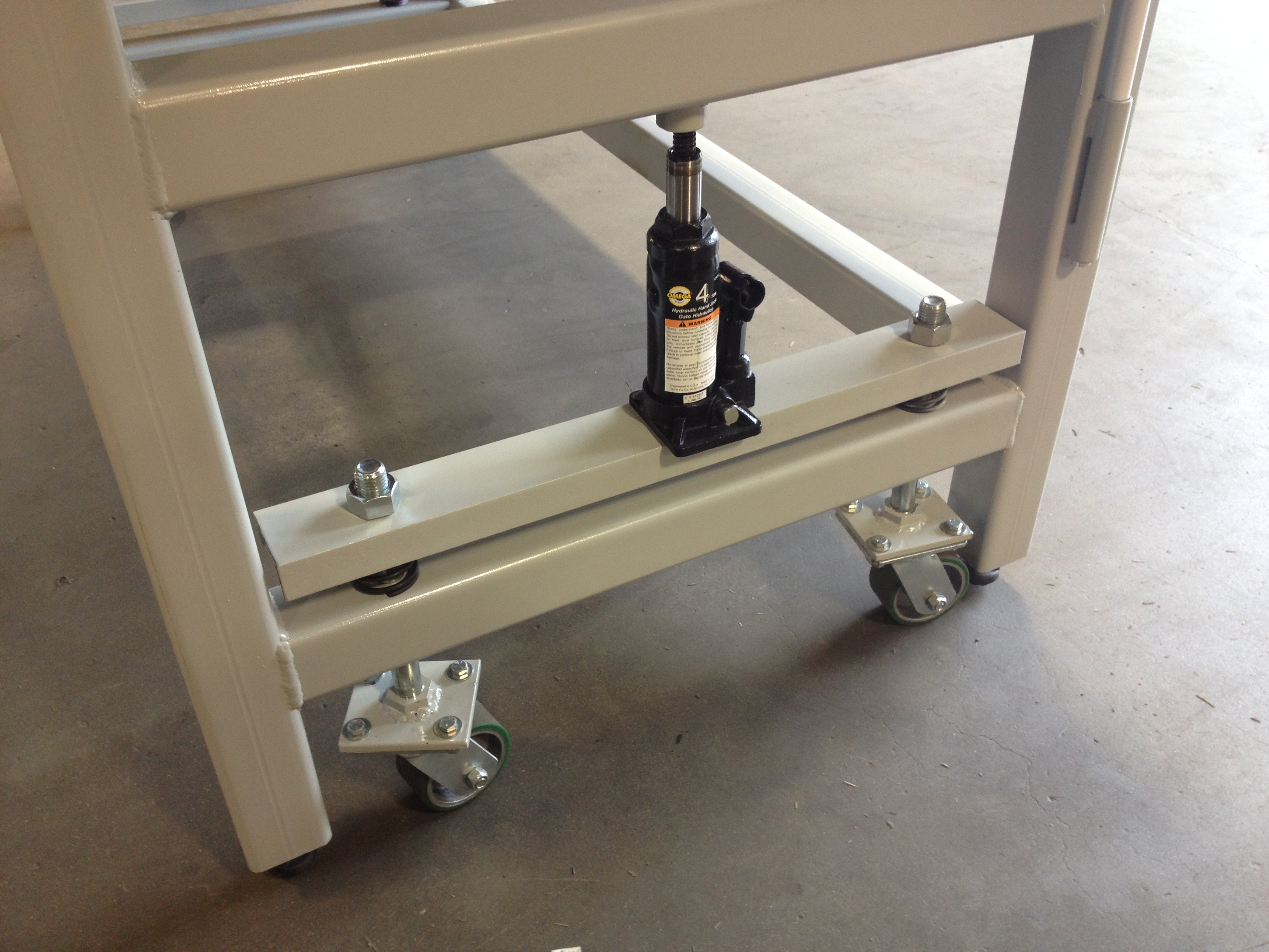 heavy duty workbench on retractable casters wheel and caster