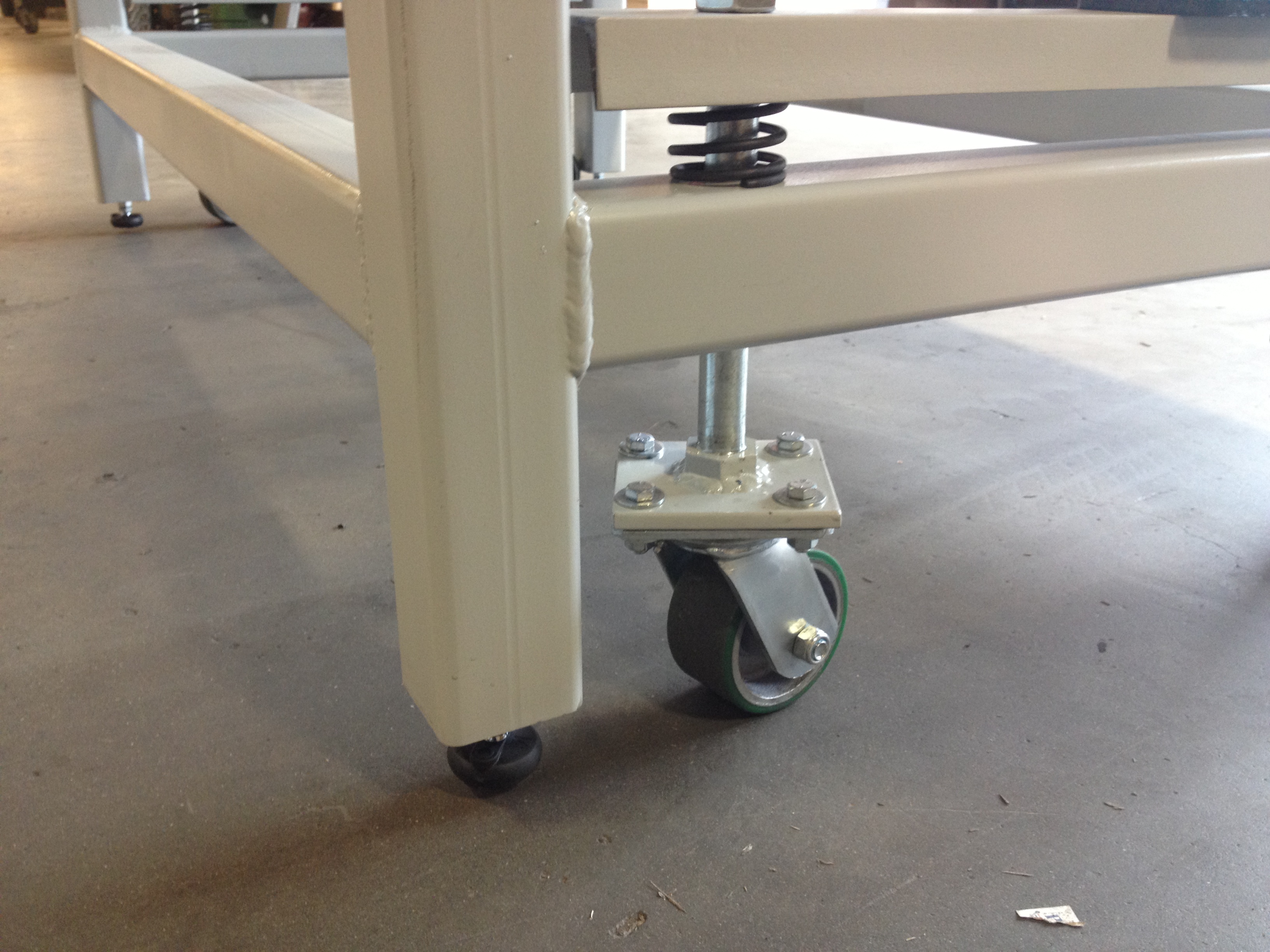 Heavy Duty Workbench on Retractable Casters | Wheel and Caster